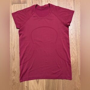 Lululemon Swiftly Tech long size 12 maroon color short sleeves
